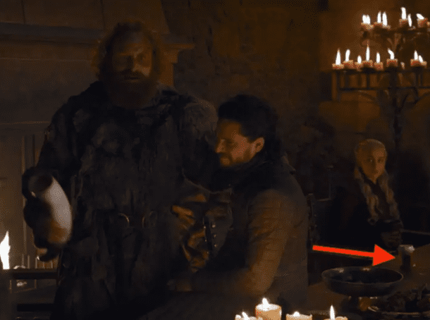 scene of GOT where a coffee-cup is on the table