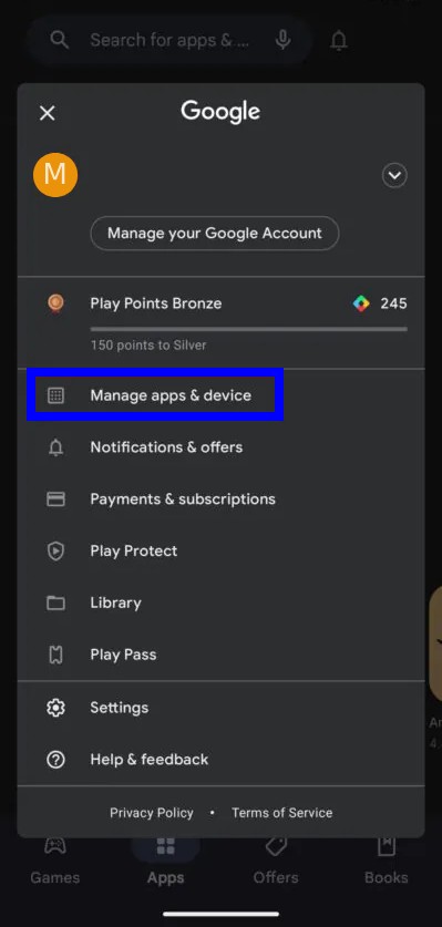 Select "Manage apps & device" from the menu
